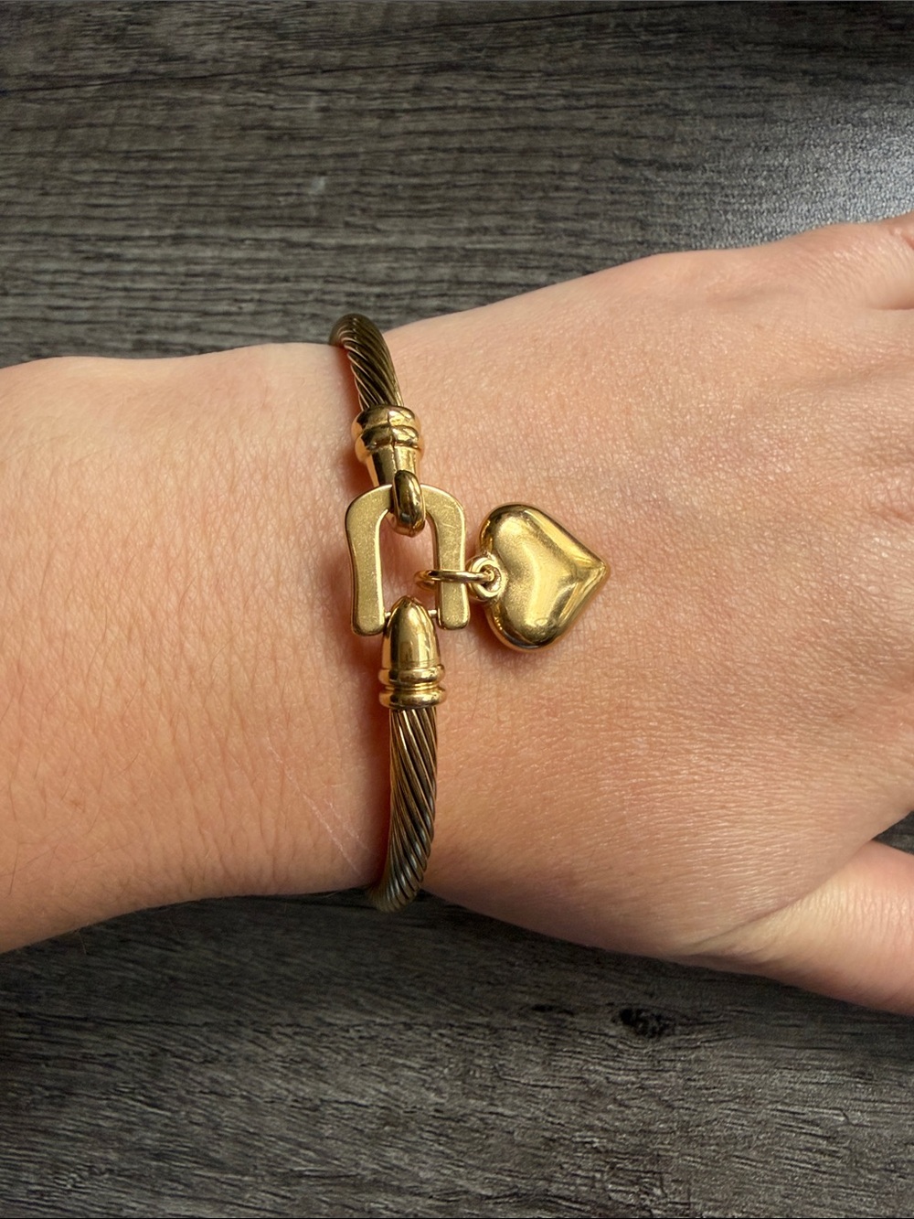 Gold plated stainless steel buckle bangle with heart charm